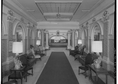 24-historic_13-b_w-view-of-lobby-with-food-counter-at-the-end-min