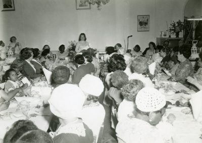 94-historic_80-b_w-photo-of-woman-speaking-at-a-function-min